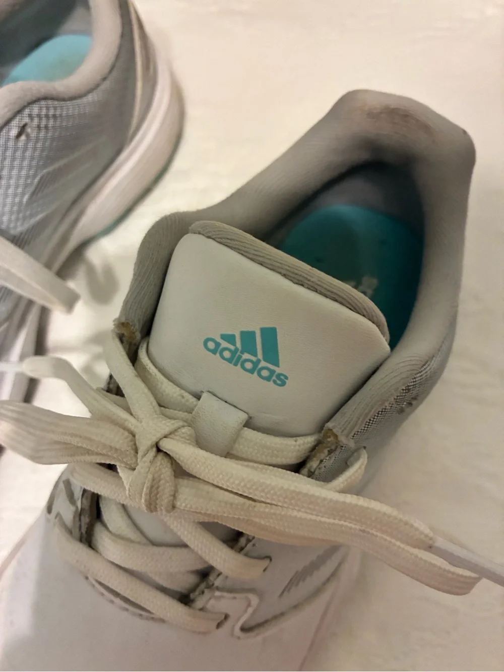 adidas Youth size 2 1/2 White cleats.